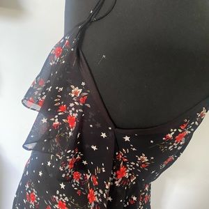 Asymmetrical high low floral print sun dress.